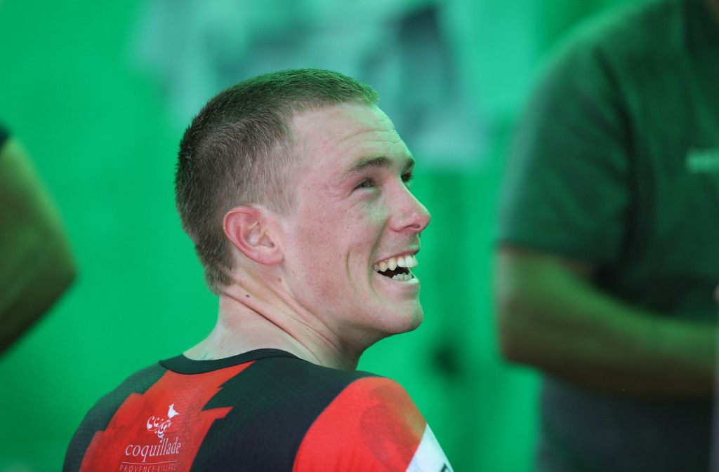 Rohan Dennis was all smiles before collecting his jersey