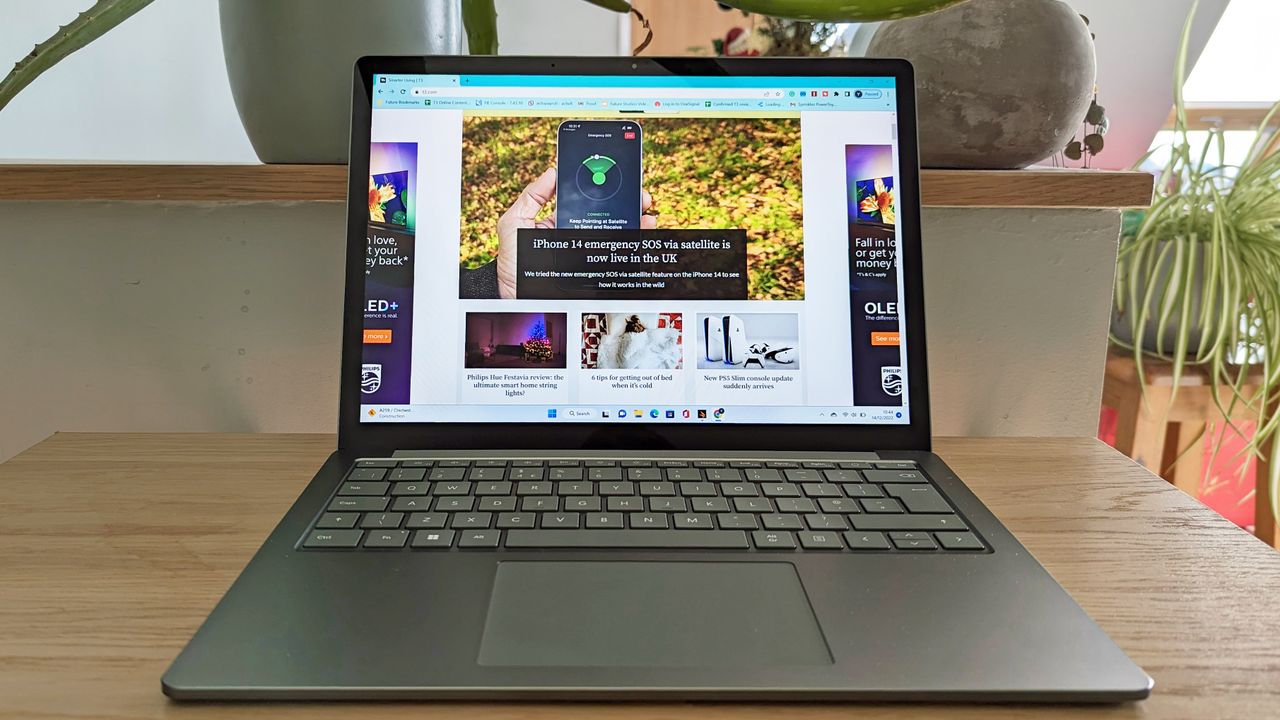 Microsoft Surface Laptop 5 review: laptop on wooden side table