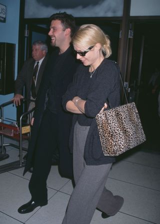 Gwyneth Paltrow wears a leopard bag in the '90s