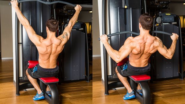 A man performing a lat pull-down as part of a workout plan for muscle gain