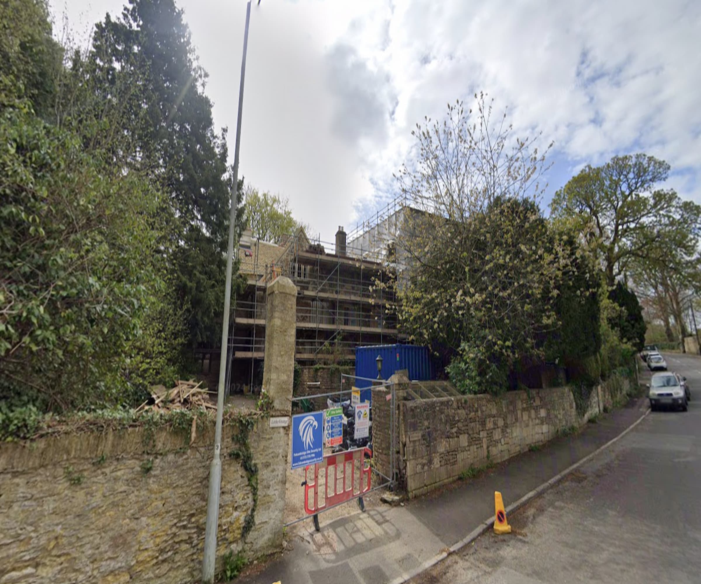 Scaffolding around a stone building