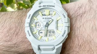 Close-up of the Casio G-Shock Move GBA950 fitness-tracking smartwatch on the writer's wrist