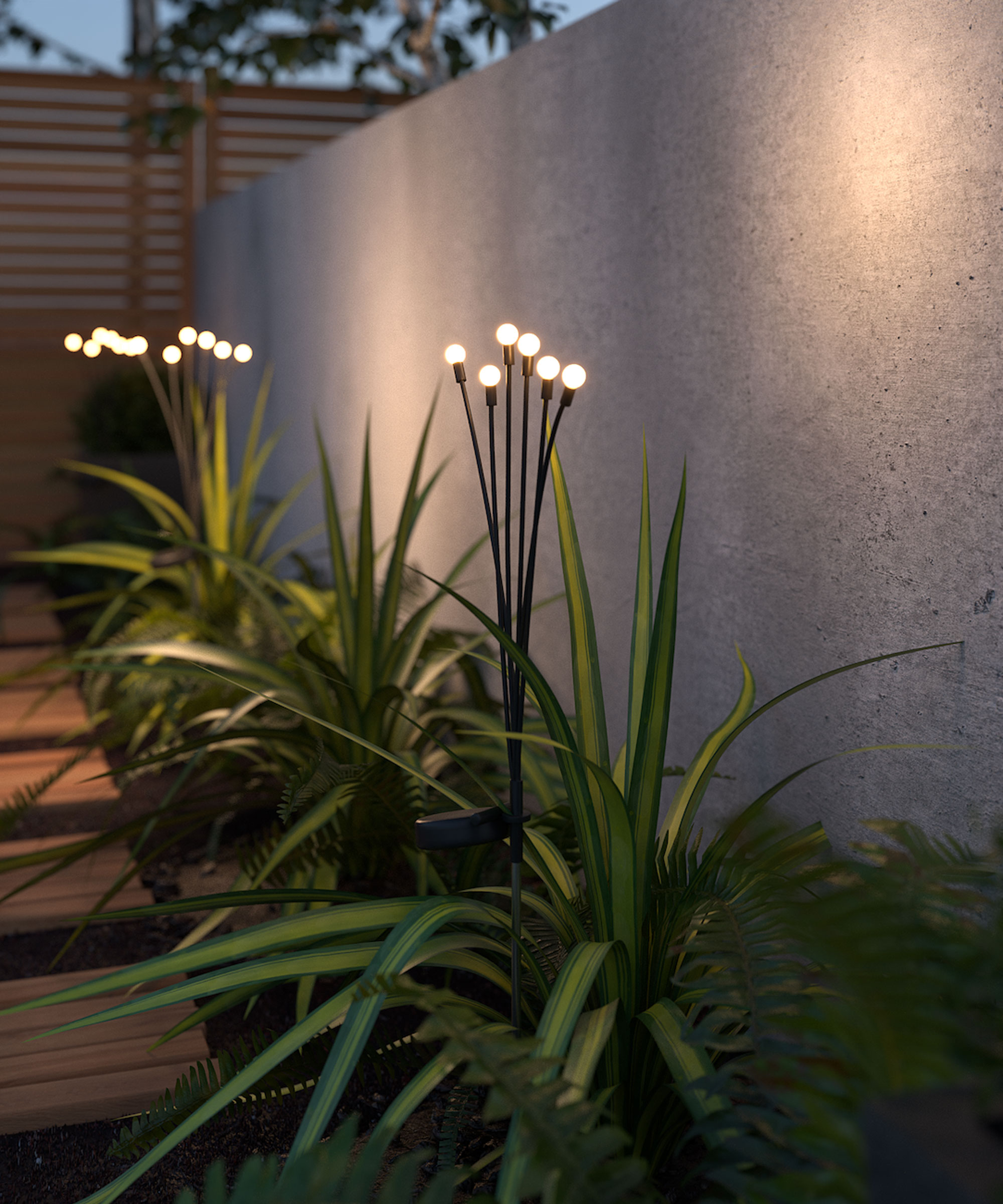 solar light spikes in garden border, path, wall and fence