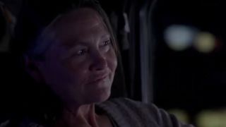 Cherry Jones smiling and looking to the right in Black Mirror