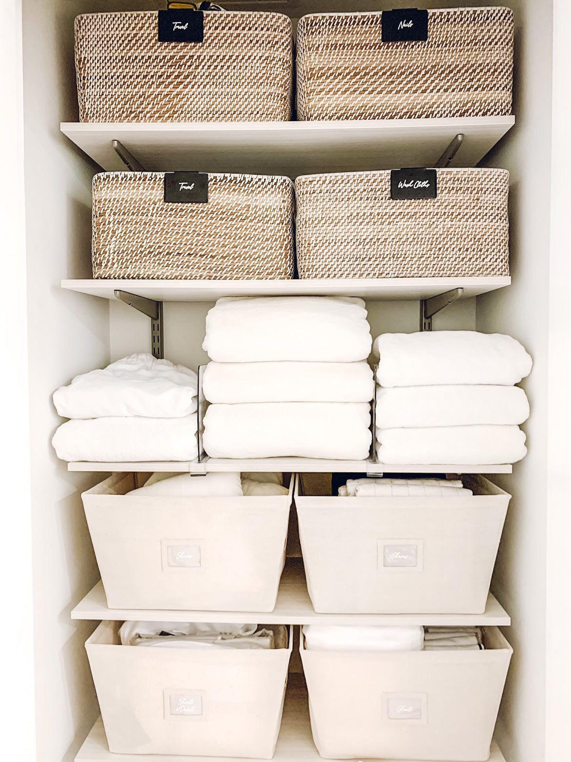 How to organize a linen closet – 9 methods that go beyond folding ...