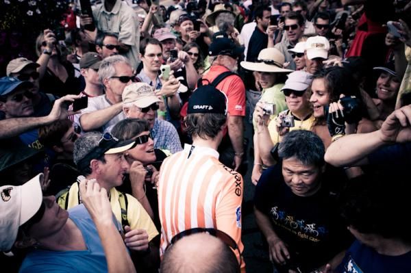 Andy Schleck (Leopard Trek) makes his way through the crowds after taking the most aggressive jersey.
