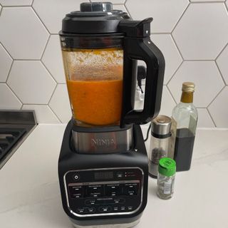 Ninja Foodi HB150UK Blender and Soup Maker jug containing blended sauce