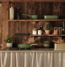George ASDA green cookware range in wood kitchen