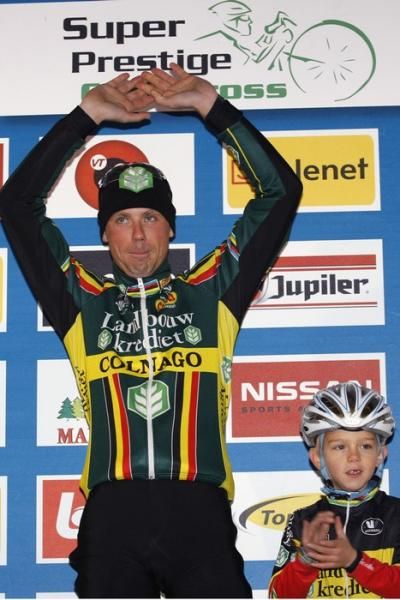 Sven Nys and his son on the podium.