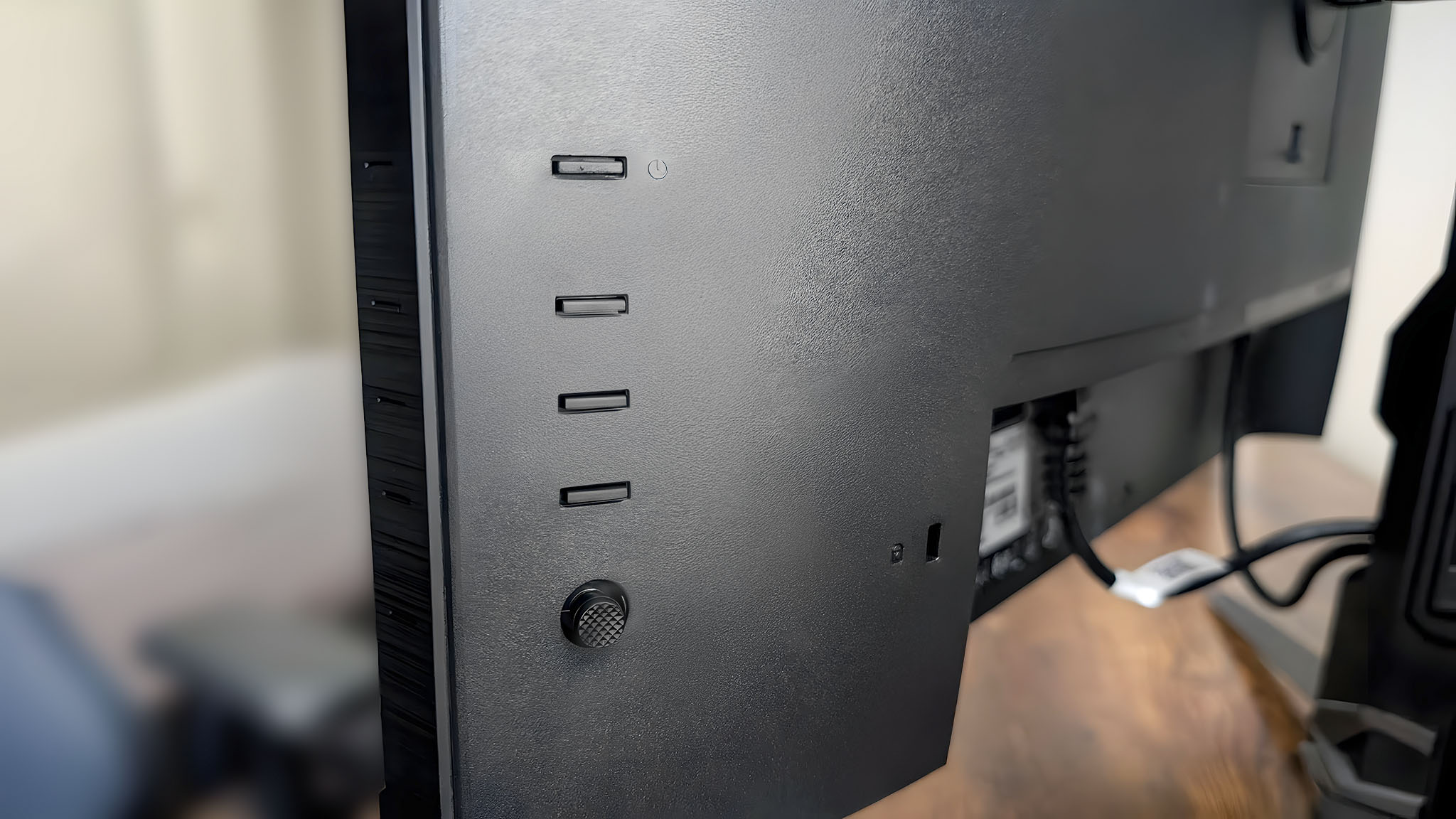 A closeup of the OSD buttons on the back of the Acer Predator XB273K.