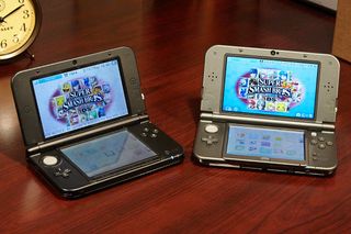 a photo of two Nintendo 3DS consoles