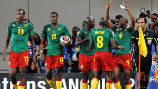 Samuel Eto'o (R) of Cameroon celebrates ahead of the Cameroon vs Guinea live stream at AFCON 2023