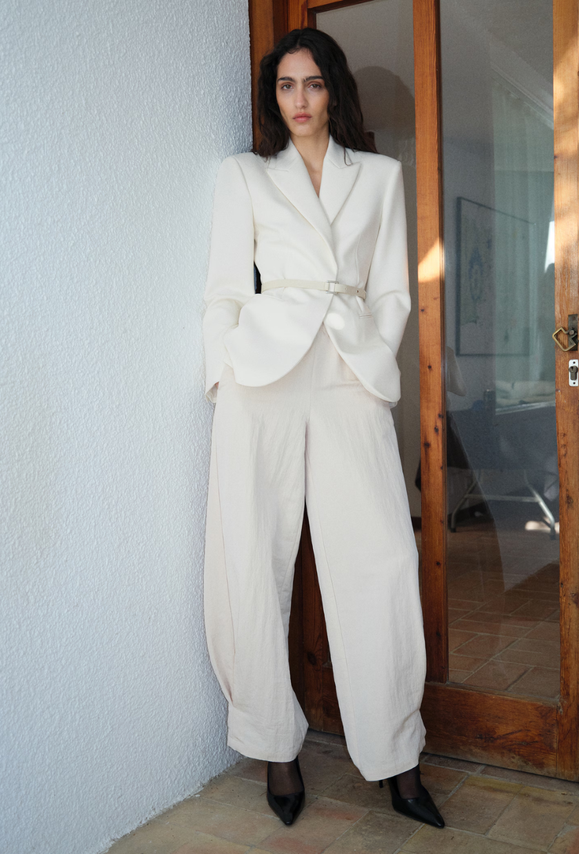 An image of a waisted blazer from Mango.