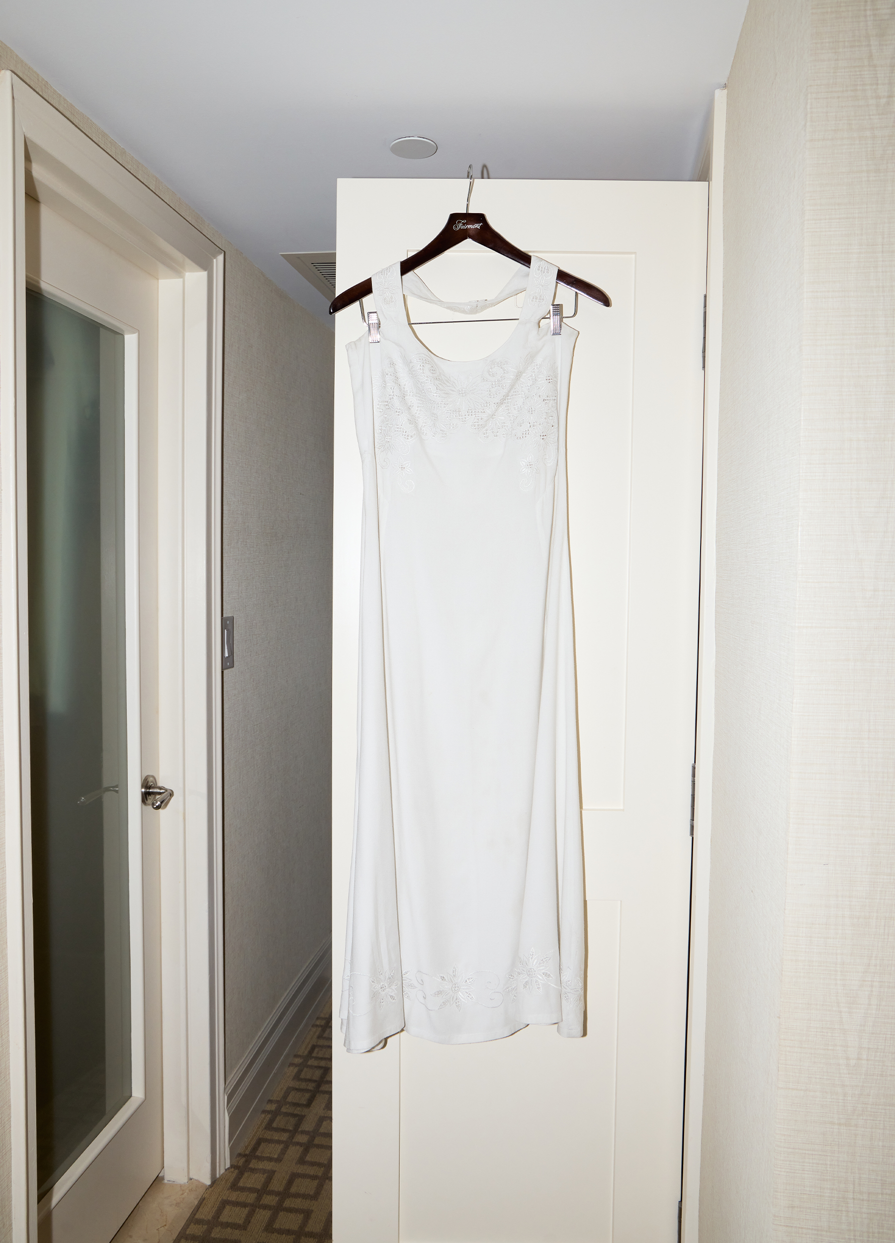 Sophie Telegadis&#039;s TIFF premiere dress hanging from her closet door.