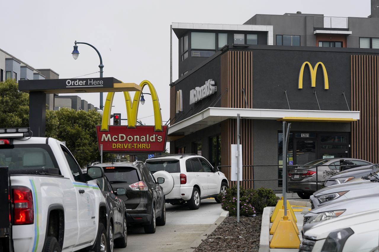 Cars in drive-thru line at McDonald&amp;#039;s.