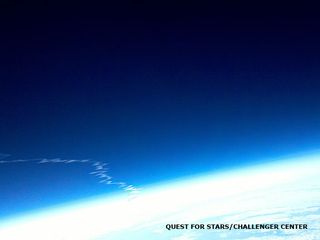 This photo of the space shuttle Discovery's vapor trail was snapped from an altitude above 70,000 feet at 5:20 pm EST on Feb. 24, 2011. It was taken by a Motorola Droid X smartphone aboard the Robonaut-1 balloon.