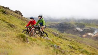 Jenny Graham and Lael Wilcox riding mountain bikes in Iceland