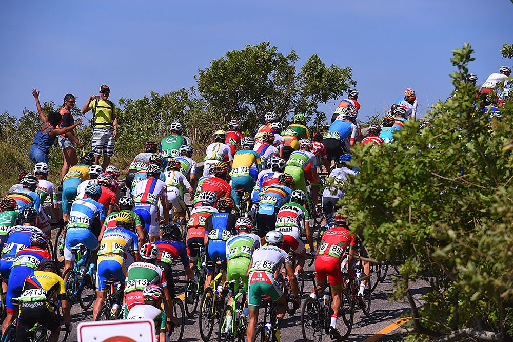 The peloton tackle the climb through Grumari Park circuit