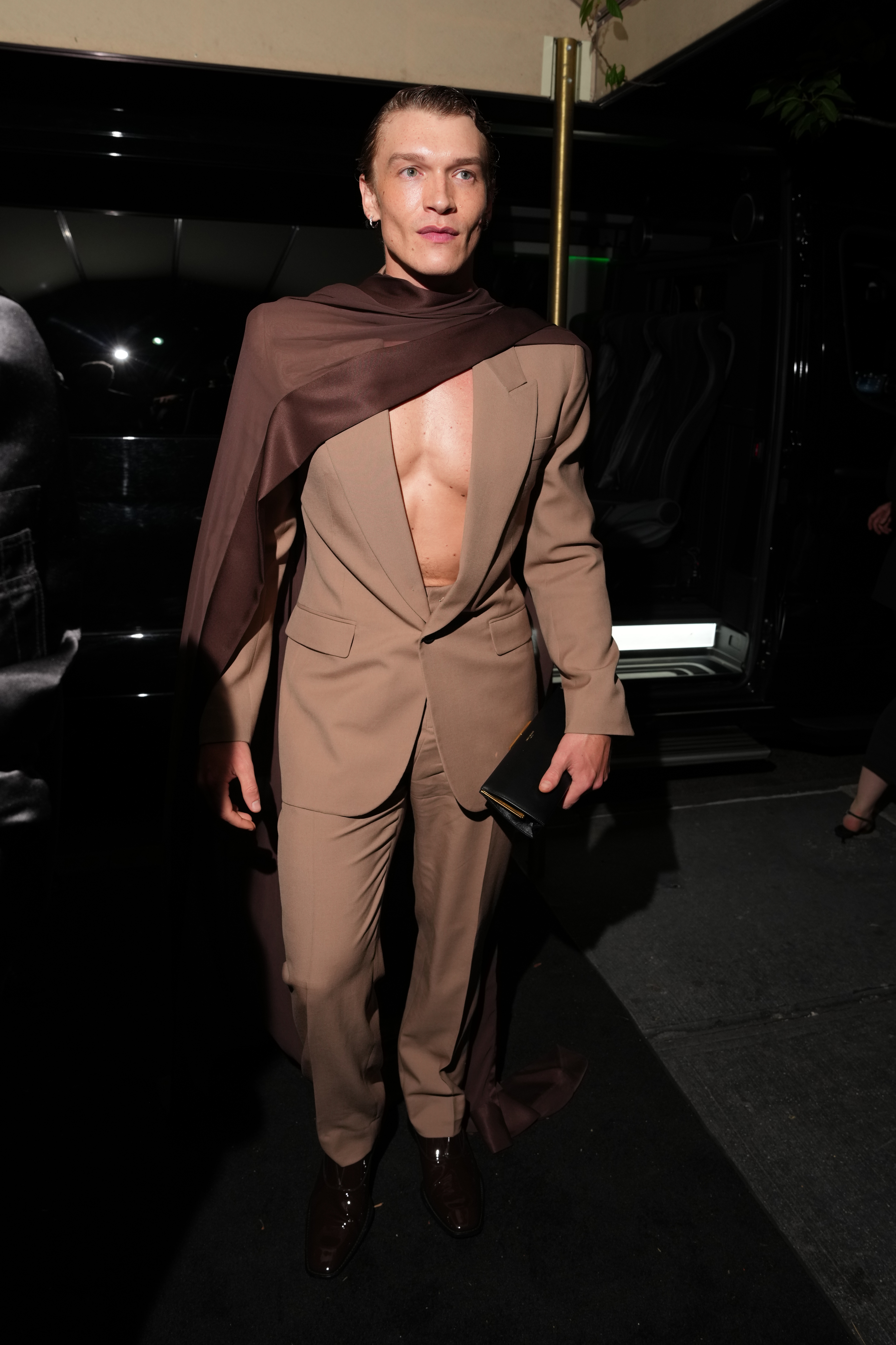 Connor Storrie attends the Met Gala after-parties shirtless