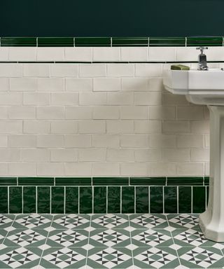 green tiles used to create faux skirting board effect