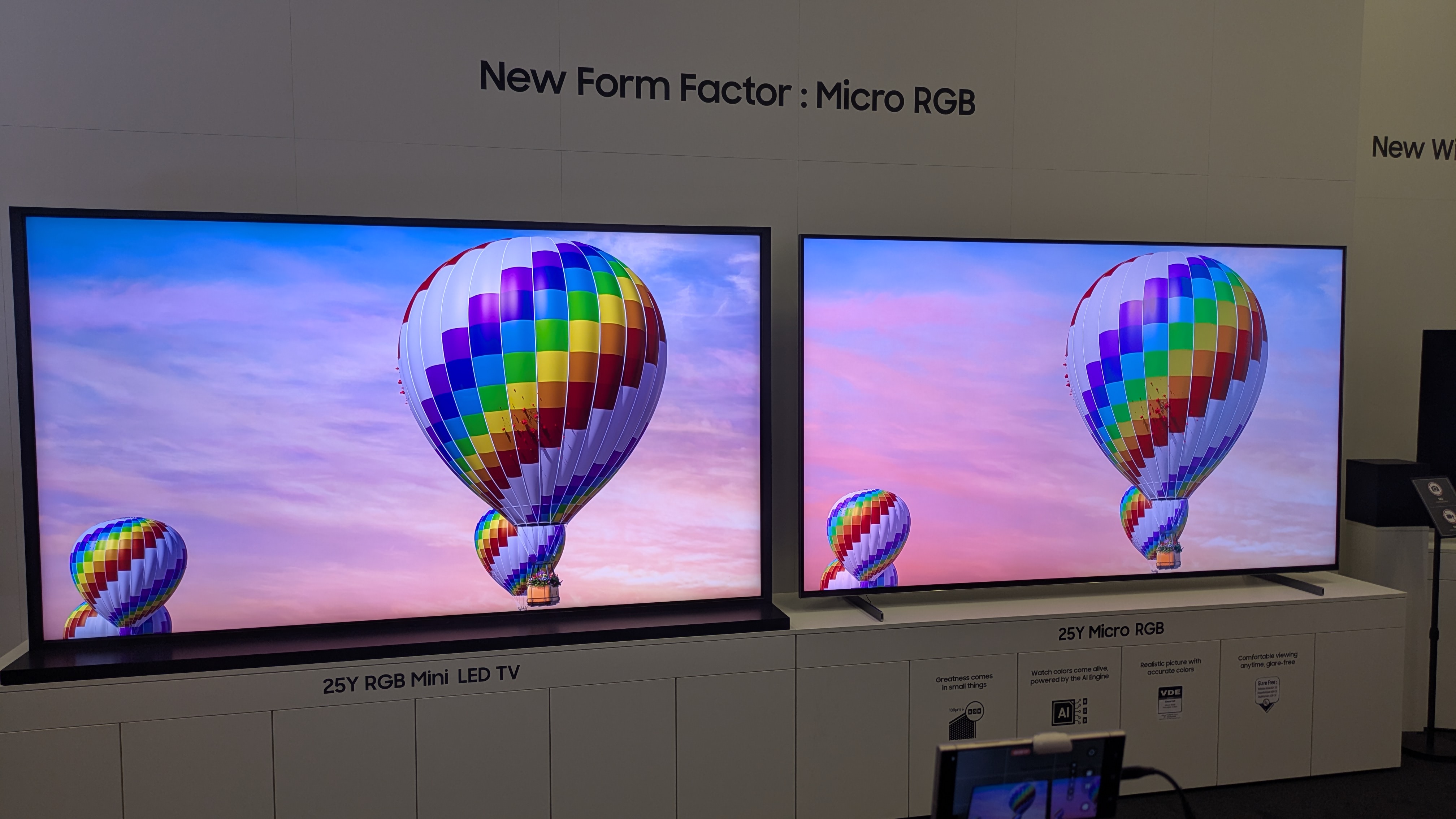 Hisense RGB mini-LED (left) and Samsung micro-RGB (right) with hot air balloon on screen