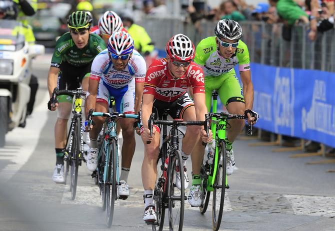 Gert Dockx (Lotto-Belisol) leads the breakaway with Marco Canola (Bardiani), Jackson Rodriguez (Androni) and Angelo Tulik (Europcar)