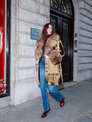 Alexa Chung wears a Valentino bag