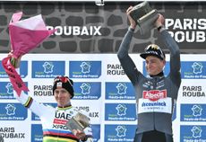 Van der Poel raises a cobbled trophy for the third year in succession after his duel with Pogačar (left)