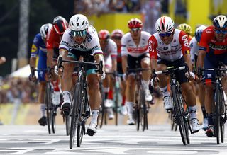 Peter Sagan (Bora-Hansgrohe) throws his bike at the line in Brussels but finishes second to Mike Teunissen (Jumbo-Visma)