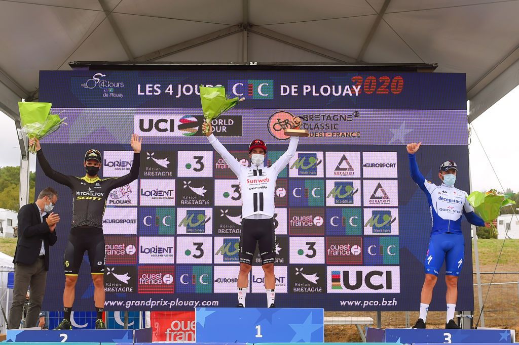 PLOUAY FRANCE AUGUST 25 Podium Luka Mezgec of Slovenia and Team Mitchelton Scott Michael Matthews of Australia and Team Sunweb Florian Senechal of France and Team Deceuninck QuickStep Celebration Trophy Covid safety measures during the 84th Bretagne Classic OuestFrance 2020 a 2478km race from Plouay to Plouay GrandPrixPlouay GPPlouay on August 25 2020 in Plouay France Photo by Luc ClaessenGetty Images