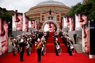 A military band plays on the red carpet ahead of the World Premiere of the James Bond 007 film "No Time to Die" at the Royal Albert Hall in west London on September 28, 2021