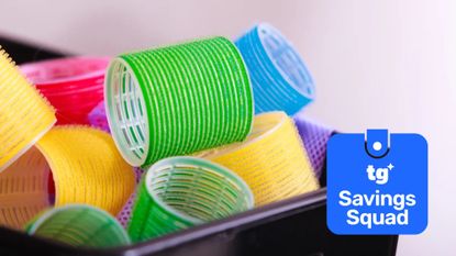 colorful hair rollers in black container