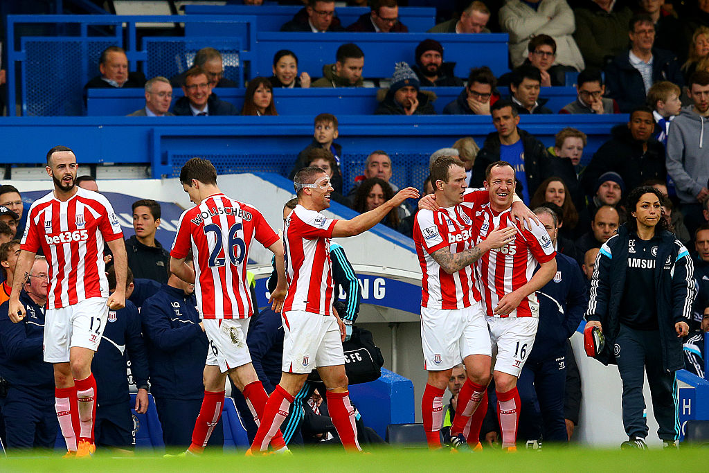 LONDON, ENGLAND - APRIL 04: Charlie Adam of Stoke City celebrates with team-mates after scoring his team's first goal during the Barclays Premier League match between Chelsea and Stoke City at Stamford Bridge on April 4, 2015 in London, England. (Photo by Richard Heathcote/Getty Images)