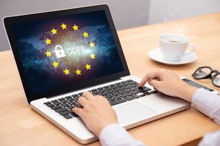 A laptop showing an EU GDPR logo.