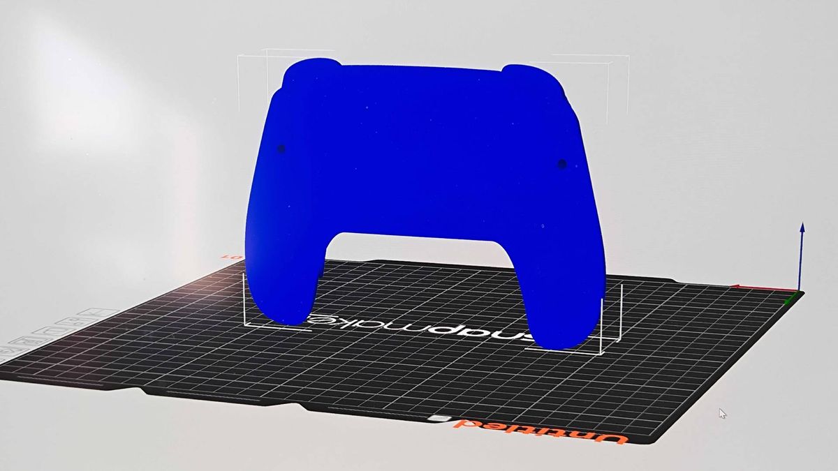 Picture of screen with Snapmaker Orca running and halved blue Steam Controller 3D STL model with solid insides.