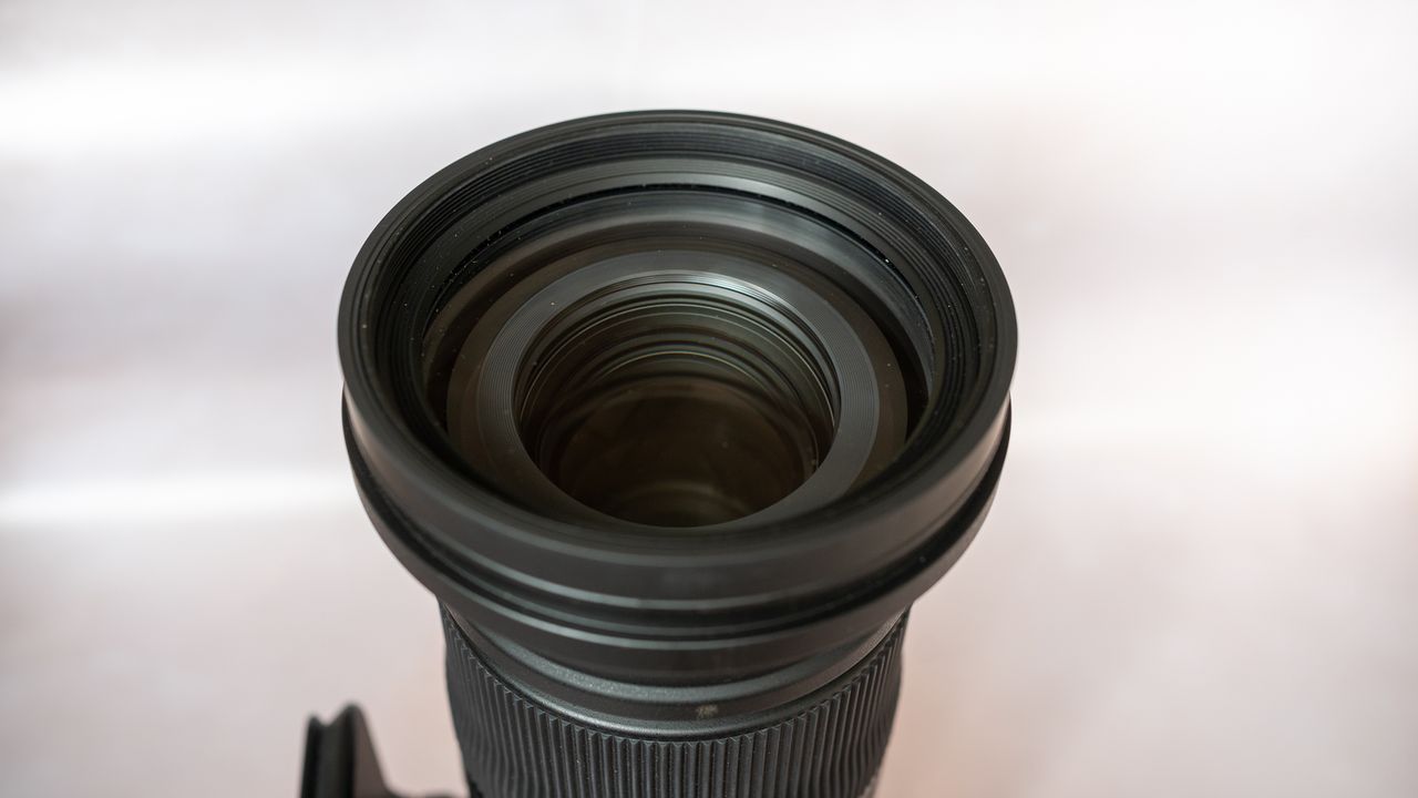 Sigma 60-600mm f/4.5-6.3 DG DN OS Sports lens on a neutral background