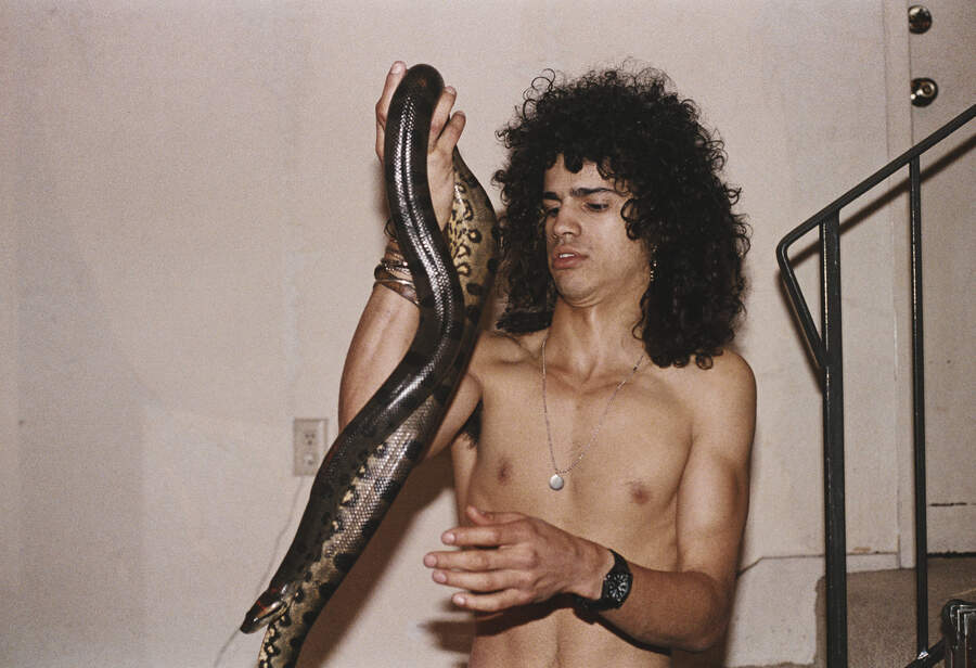Slash holding his snake