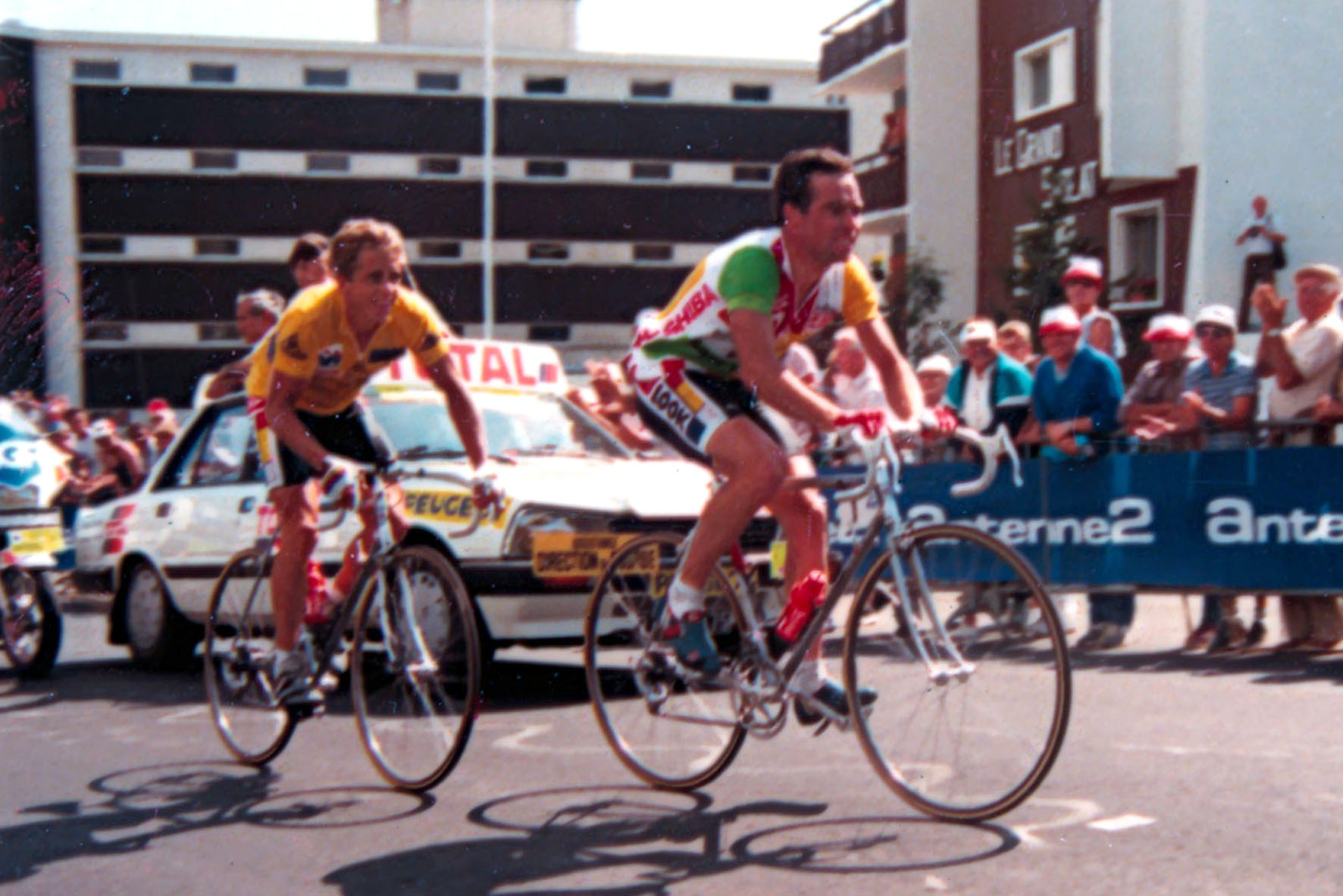 Greg LeMond and Bernard Hinault ride up Alpe d'Huez