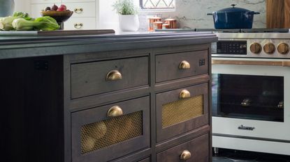 Close up image of produce drawers in a kitchen island