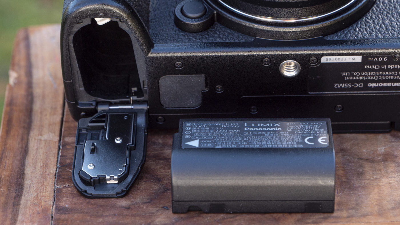 Panasonic Lumix S5 II camera on a table with the battery removed