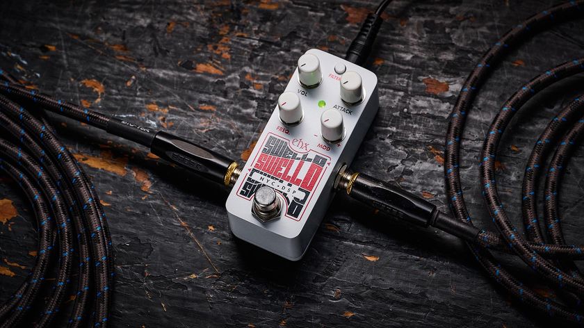 Electro-Harmonix Pico Swello: the compact mini-pedal is finished in white and has black and white text, four knobs, and is photographed against a distressed wood floor.