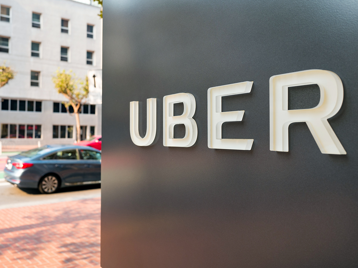 Uber logo on a building sign