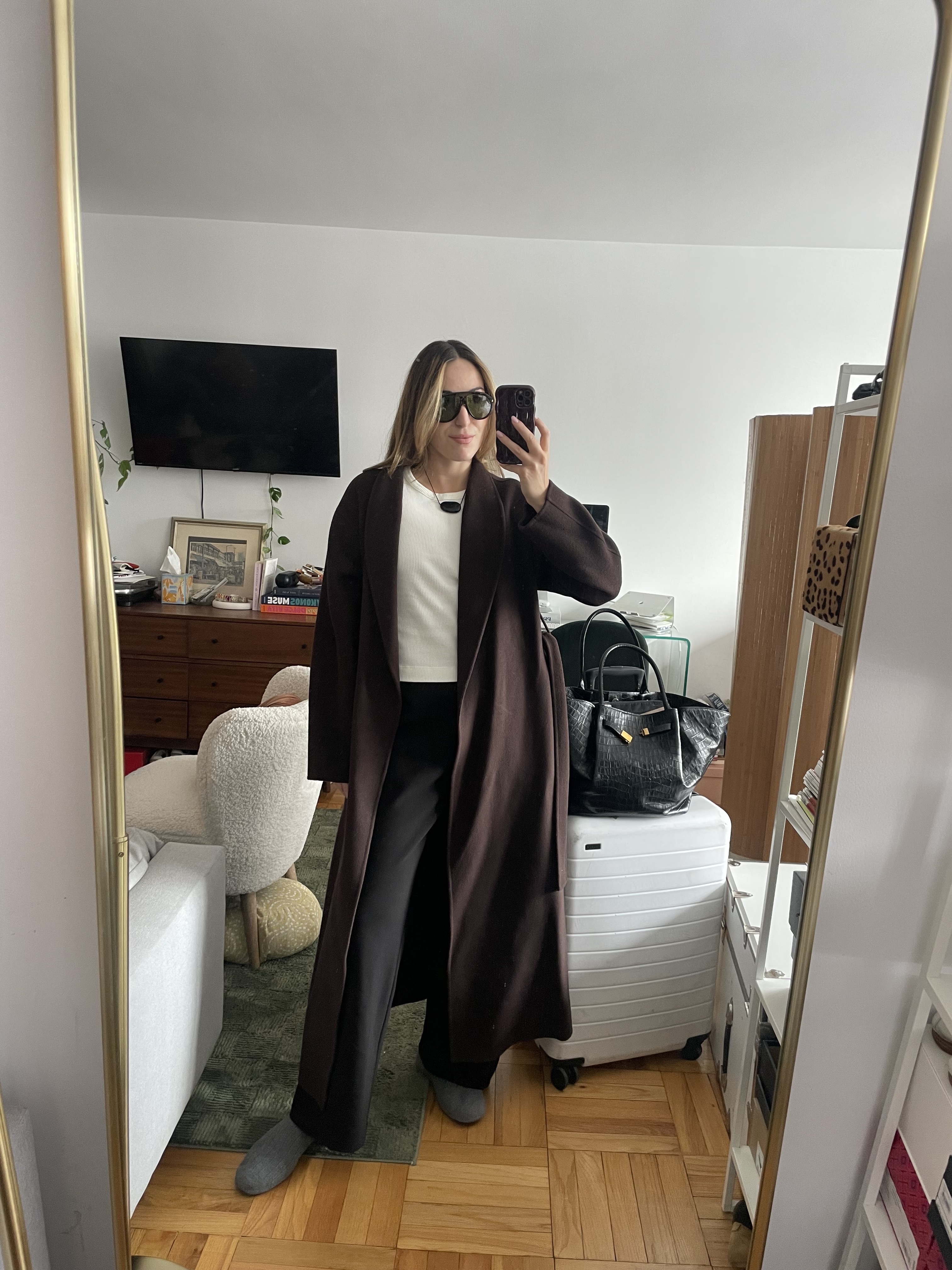 Anna LaPlaca wearing travel-friendly pants that aren't leggings but aren't jeans