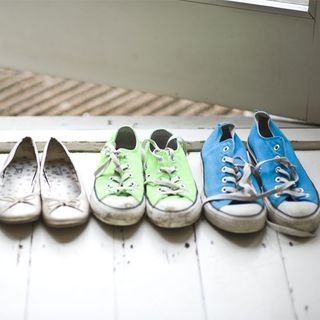 coloured shoes in white shoe rack