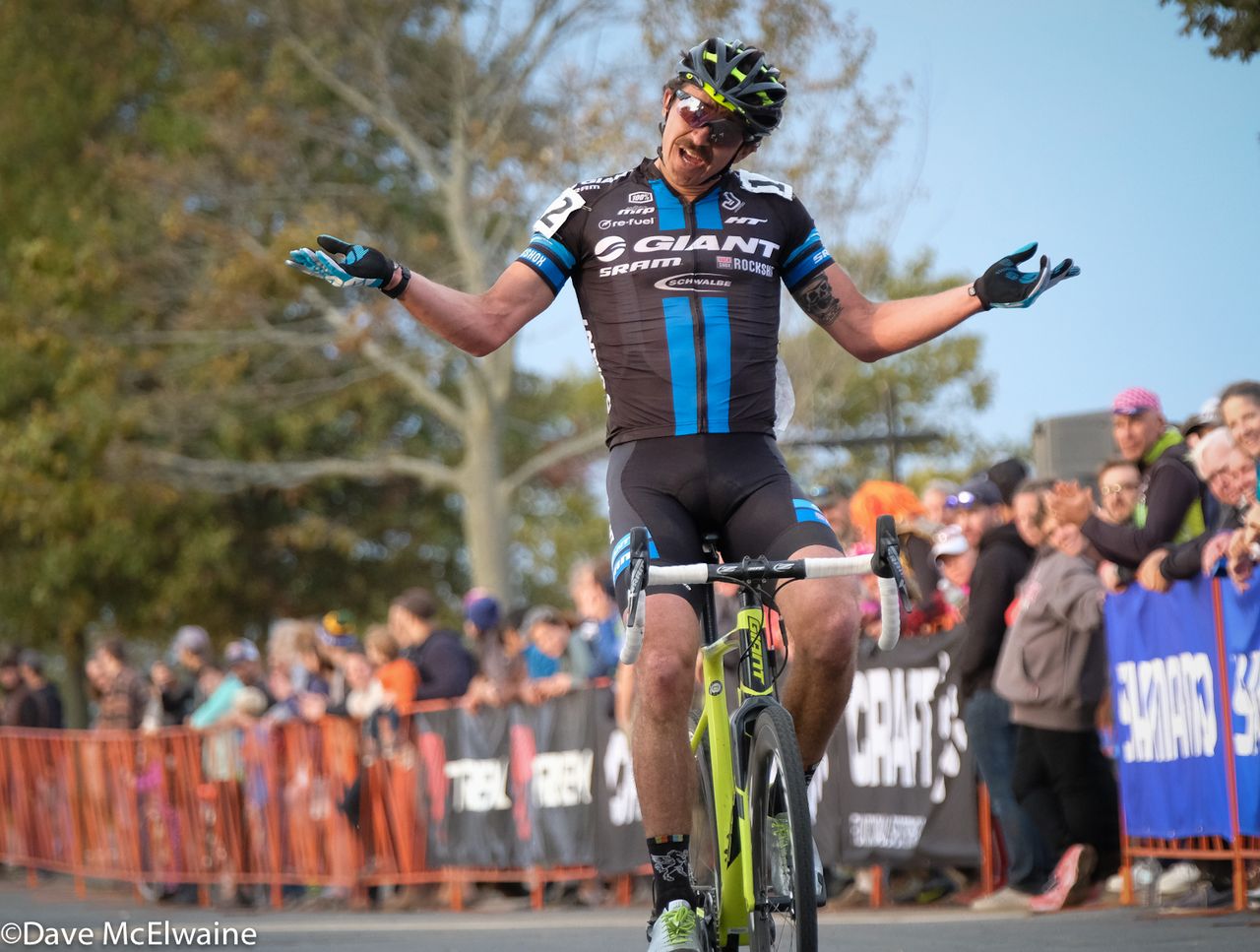 Adam Craig (Giant) makes his trademark salute while finishing in fourth place.