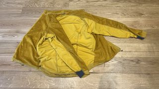 Rab Vapour Rise Cinder jacket on the floor