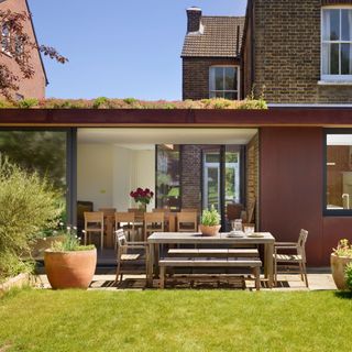 Green roof on flat roof extension, which opens out on to the patio and garden