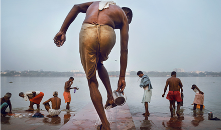 (c) Nick Ng, Malaysia, Entry, Split Second Category, Open Competition, 2015 Sony World Photography AwardsIMAGE TITLE: The Morning RitualIMAGE DESCRIPTION: A man washes his feet before bathing