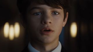 A close-up of Ferdia Shaw as Artemis Fowl in Artemis Fowl