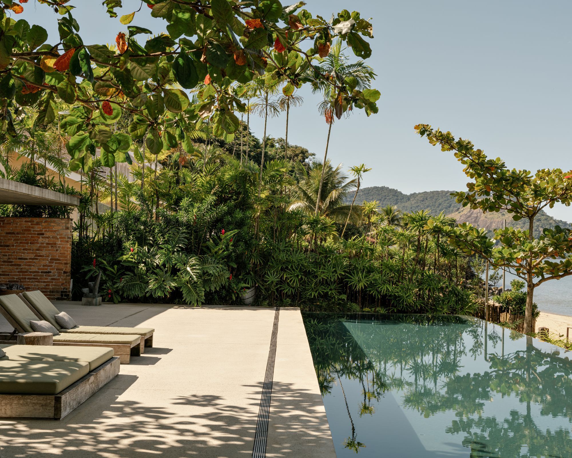 Modern house with pool looking out to sea